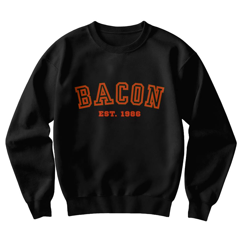 Black sweatshirt with 'BACON EST. 1986' text in orange on a white background